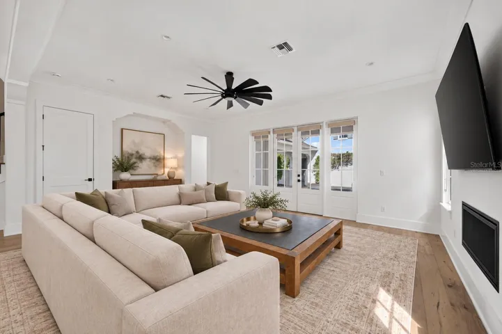 Living room overlooking the courtyardVirtually Staged
