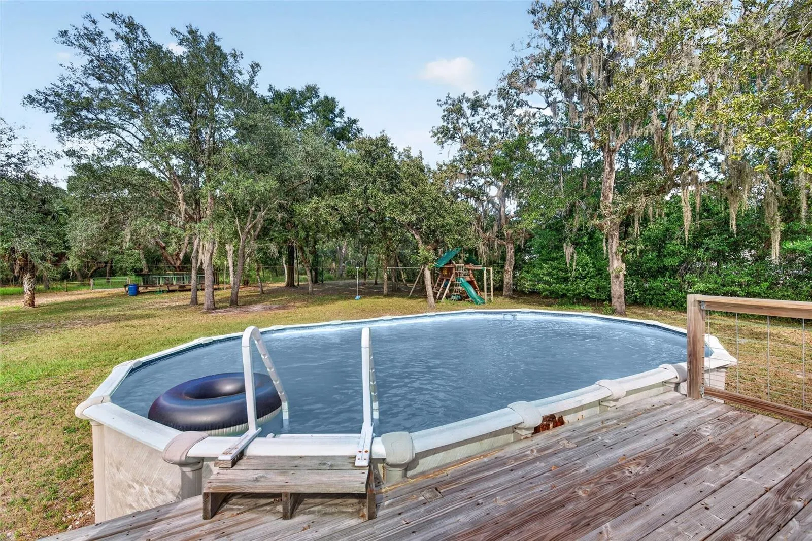 Rear porch overlooking the large yard