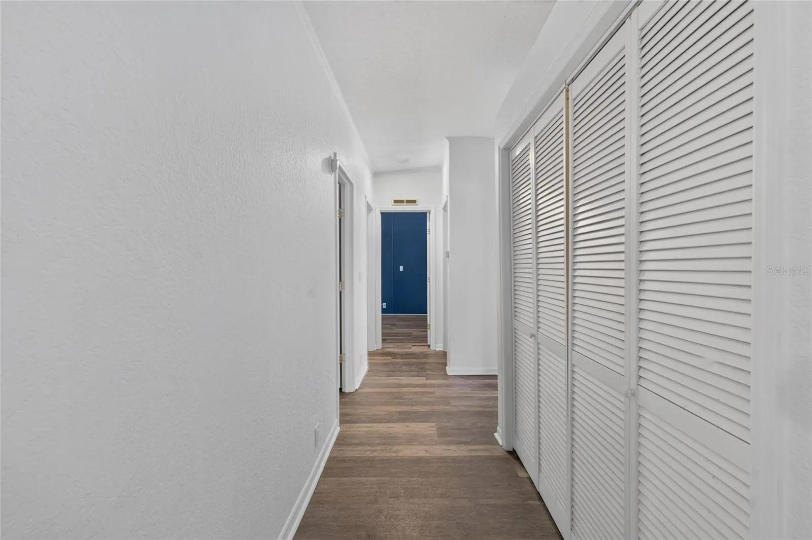 Looking down hallway to bedrooms