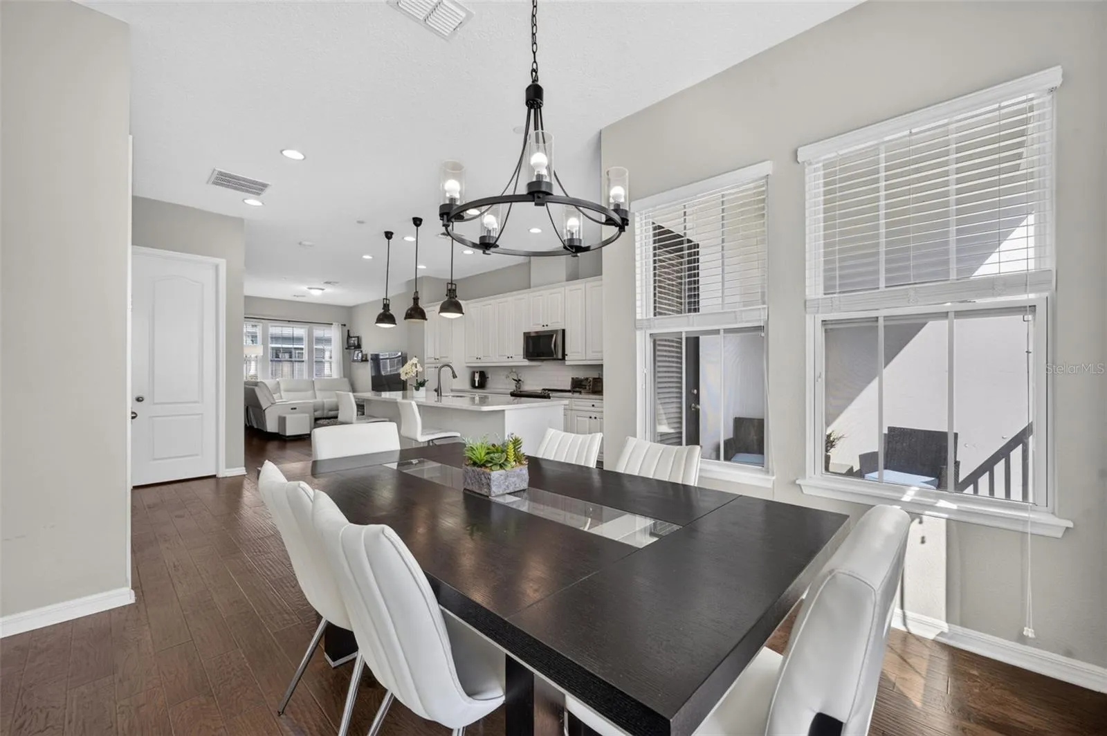 The spacious Dining room has plenty of room for guests at the large table!