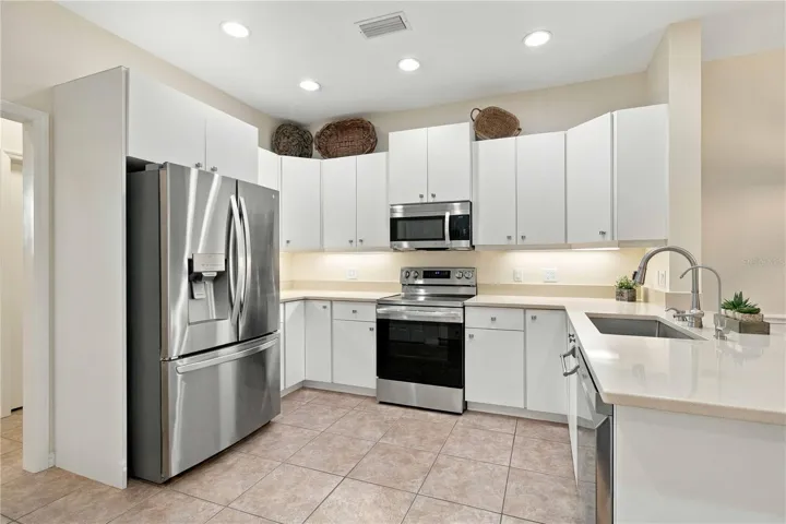Kitchen with breakfast bar and pantry