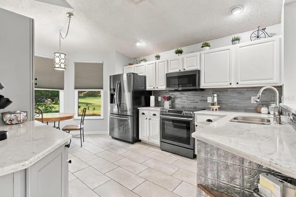 Spacious kitchen with appliances