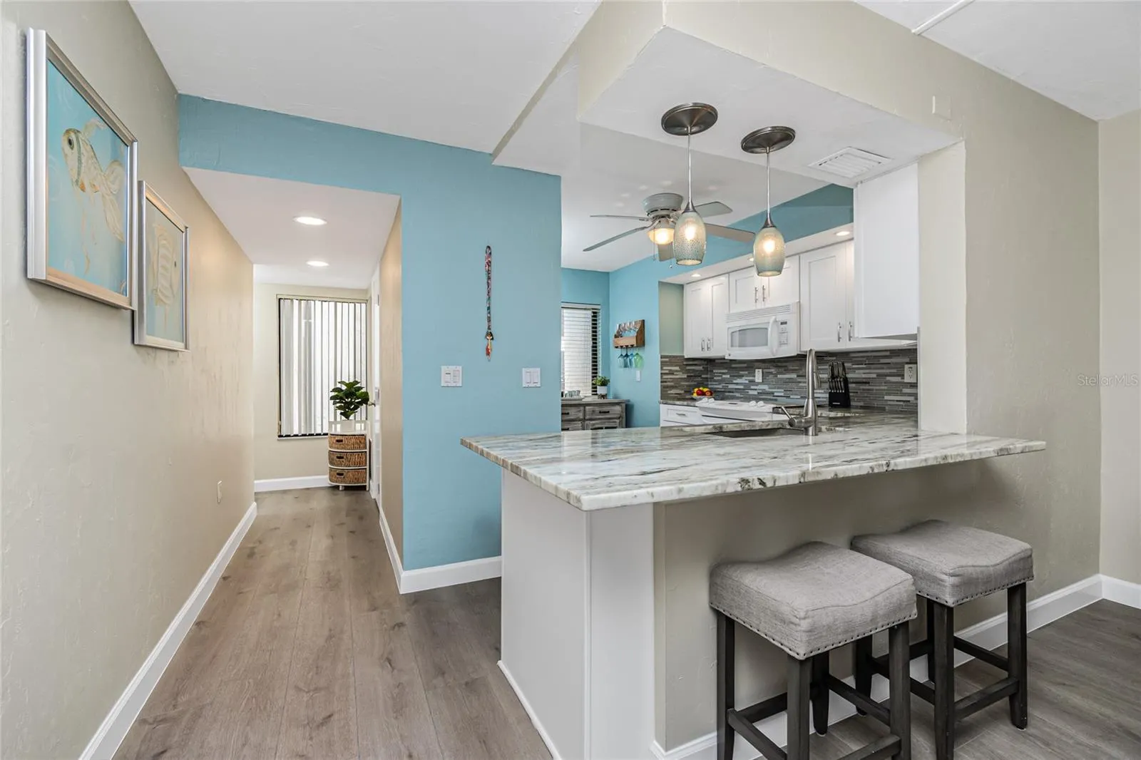 Looking Back to Entry and Into the Kitchen