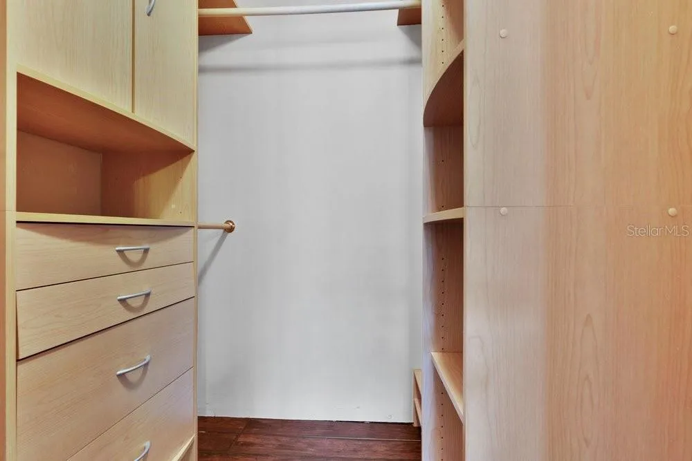 Walk in closet with custom closet system