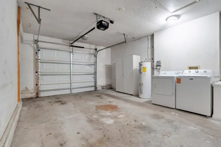 Garage with laundry area.