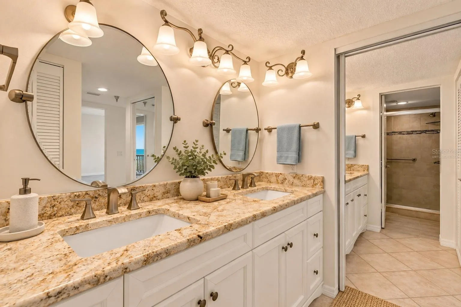 Virtually staged photo.Primary bathroom