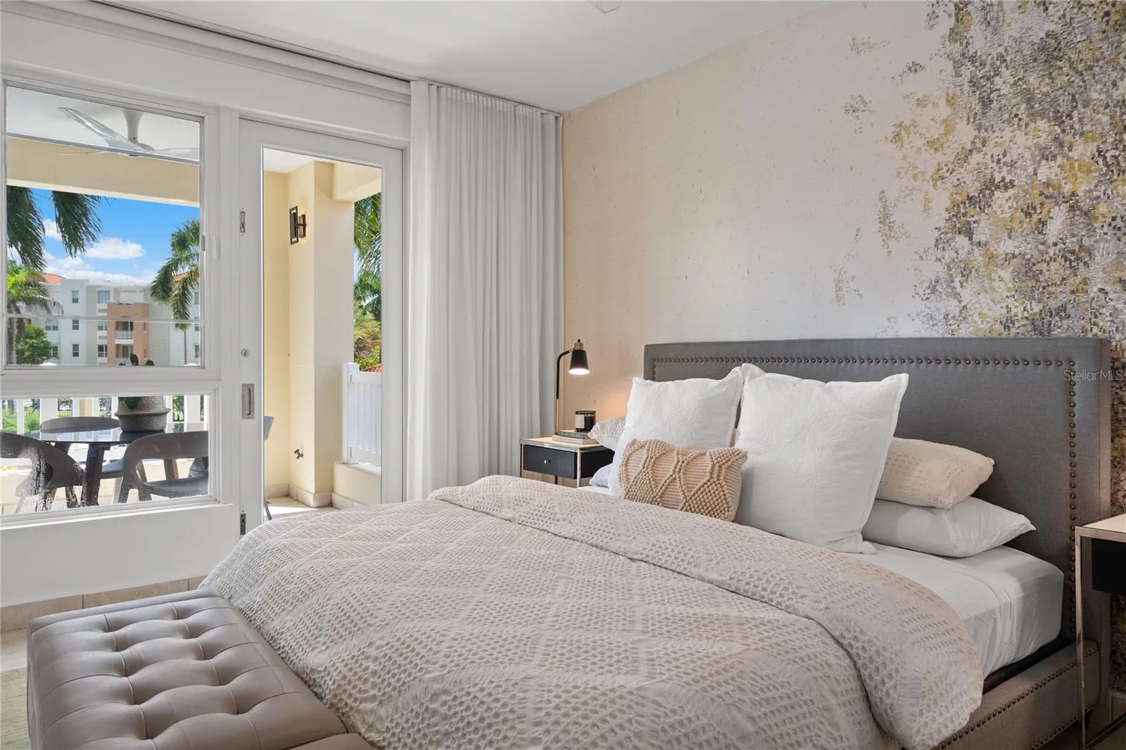 Primary Bedroom with balcony access