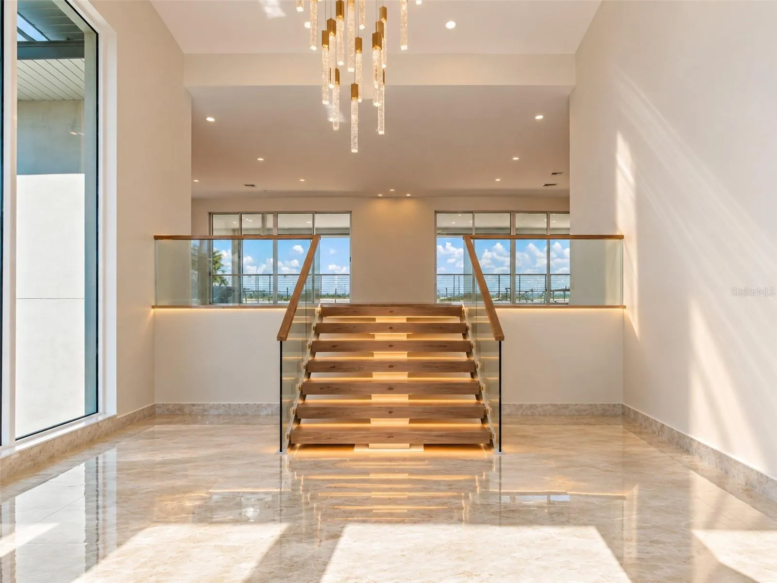 Rendering of finished railing and staircase- this will be completed by seller shortly.