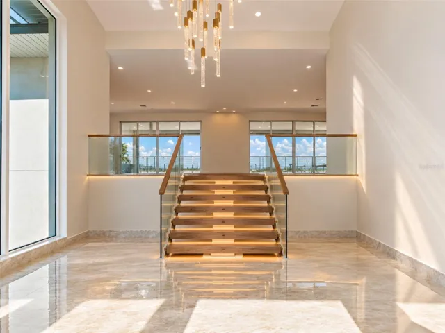 Rendering of finished railing and staircase- this will be completed by seller shortly.