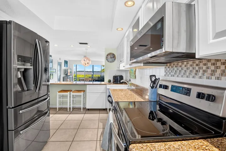Kitchen facing out to bay area