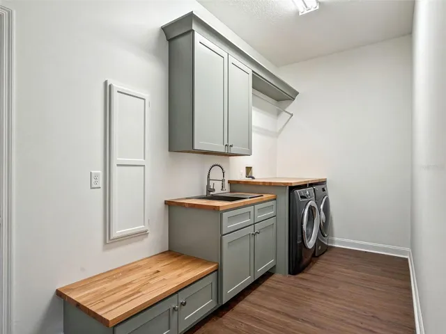 Laundry Room with Custom Cabinets