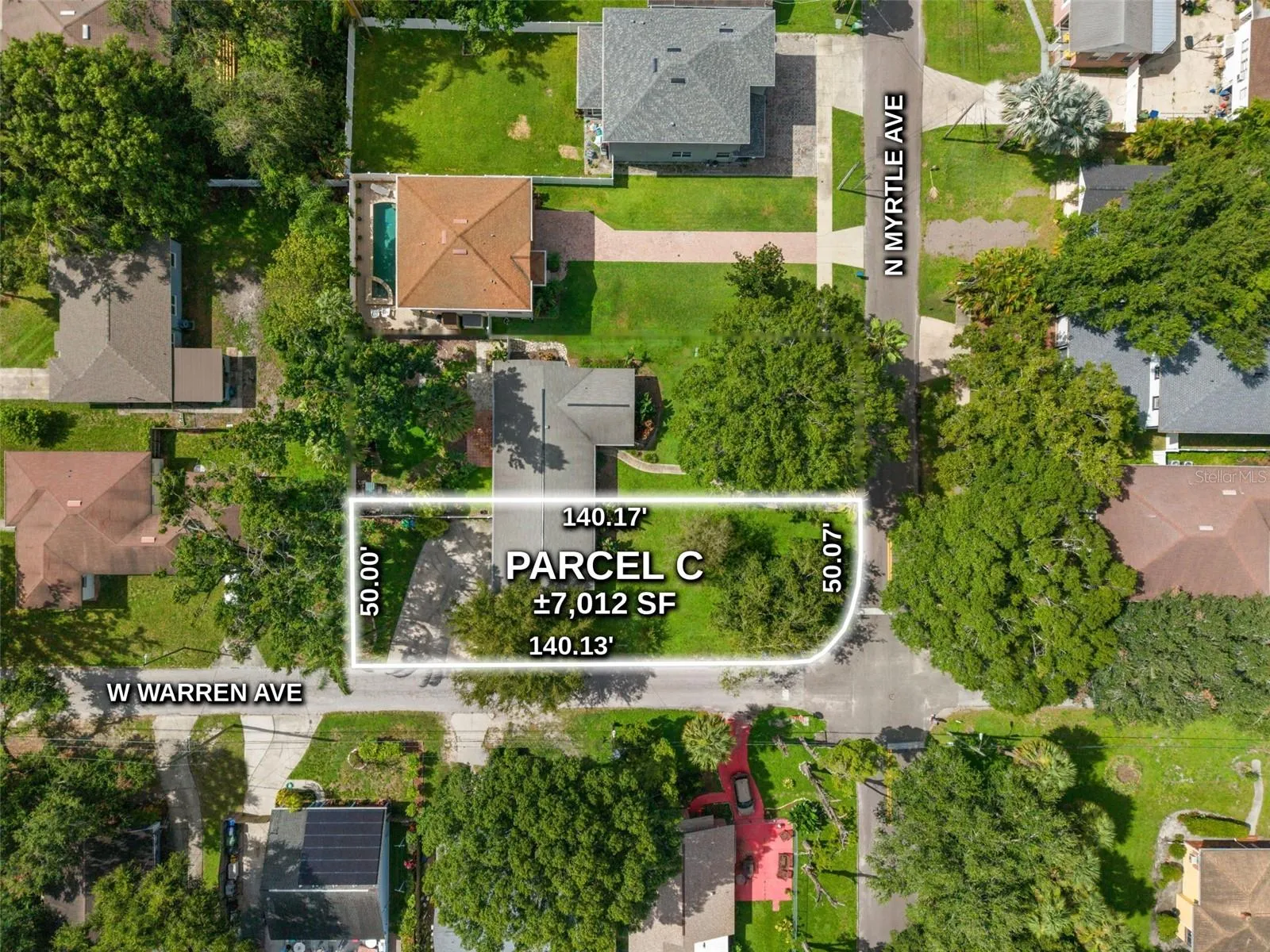 Aerial of the corner lot at N Myrtle Ave and W Warren Ave, about 7,012 SF