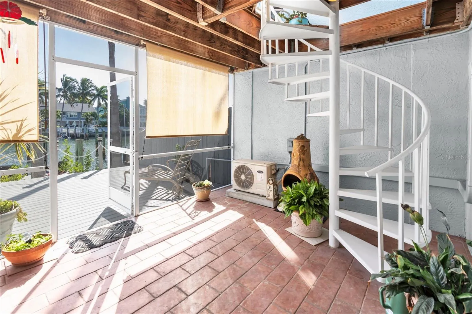 Expansive entertainment area adjacent to deeded boat dock