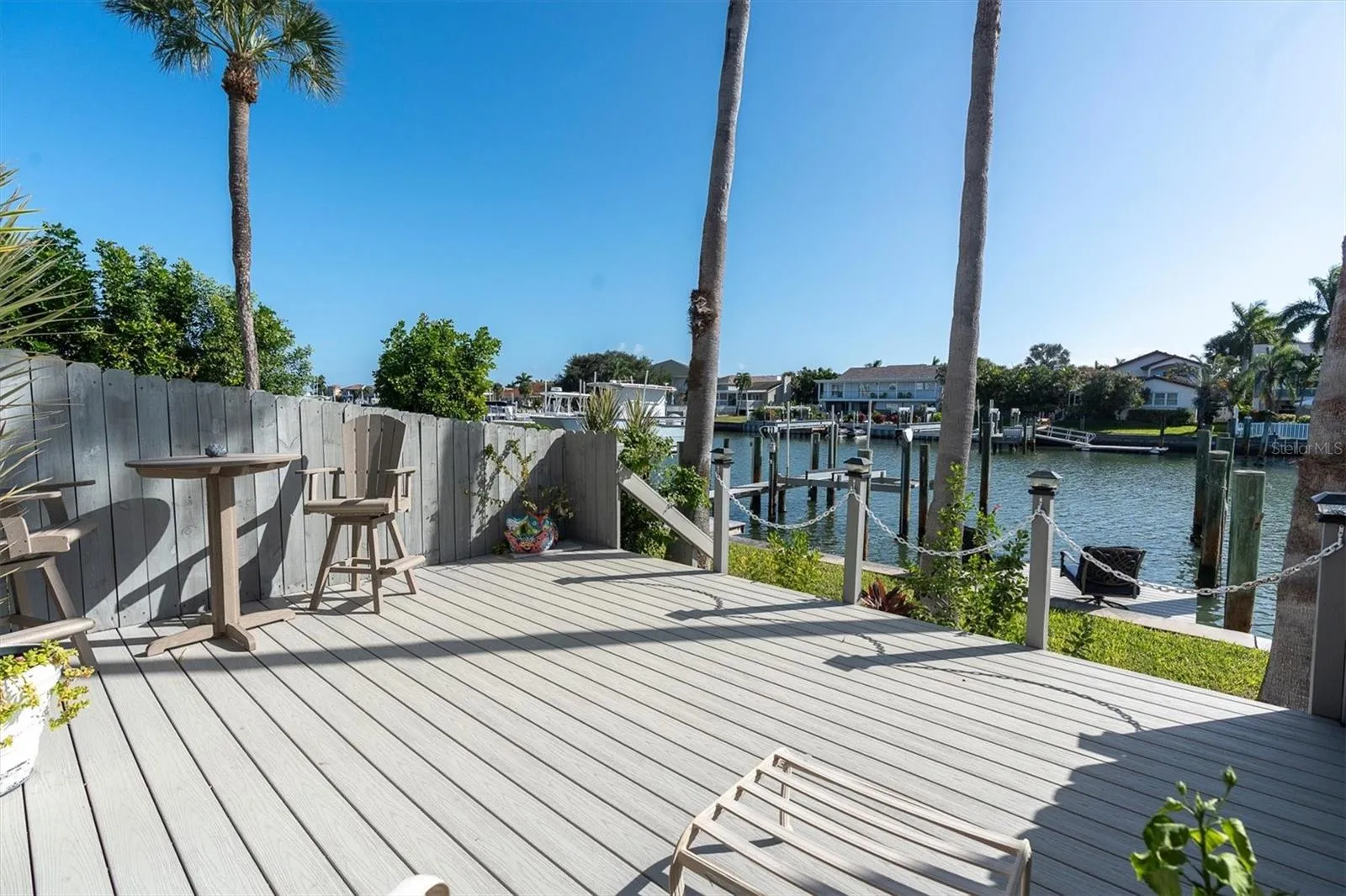 Large deck in backyard leads to your private deeded boat slip