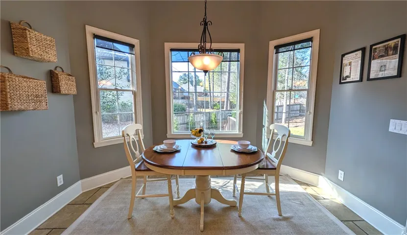 Breakfast nook overlooks backyard.