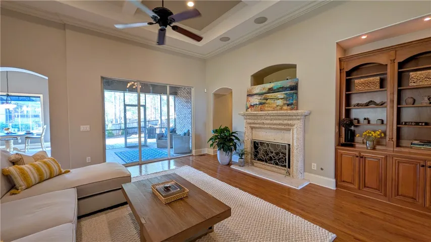 Great room with kitchen & screen porch in background