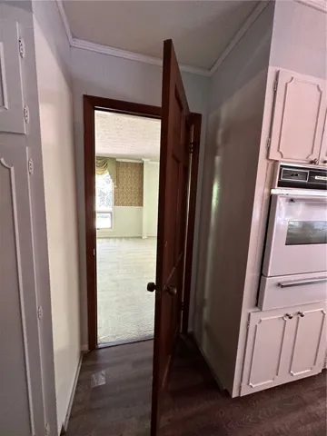 kitchen door to formal dining room
