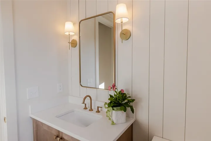 This sleek bathroom vanity features a modern design, providing both style and functionality.