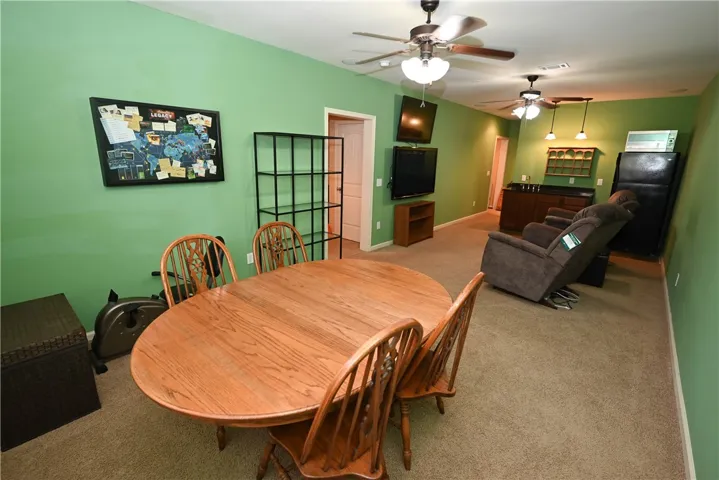 Downstairs/Basement offers an additional living space and a kitchenette.