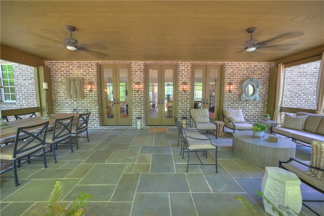 The great living room leads to the massive enclosed patio!