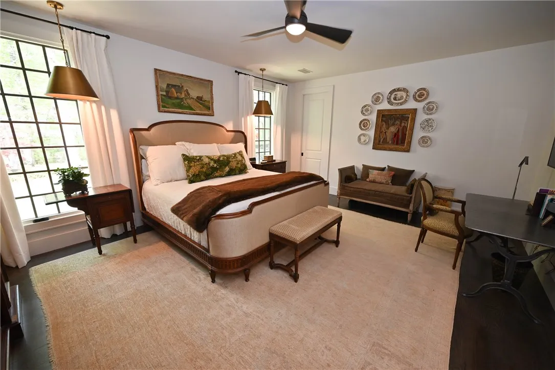 The private master bedroom has a convenient pocket-door study.