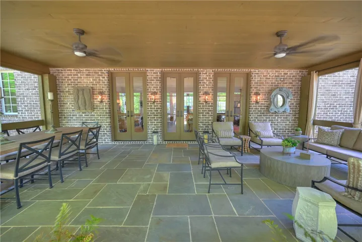 The great living room leads to the massive enclosed patio!