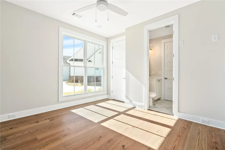 SECOND BEDROOM MAIN LEVEL WITH FULL BATH & 2 CLOSETS