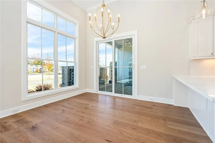 BRADFORD DINING AREA WITH PRIVATE COURTYARD AND ABUNDANCE OF NATURAL LIGHT
