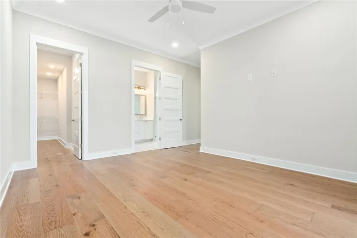 PRIMARY BEDROOM MAIN LEVEL LARGE WALK IN CLOSET