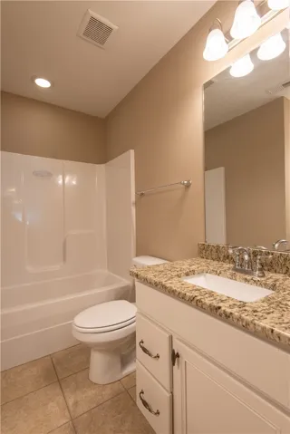 Guest bath with granite c-tops (prior to tenants moving in)