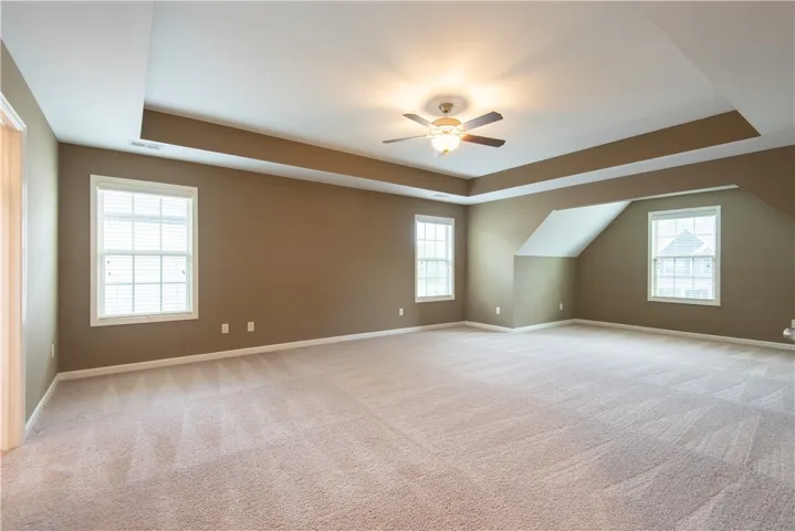Primary Suite is huge with tray ceiling (prior to tenants moving in)