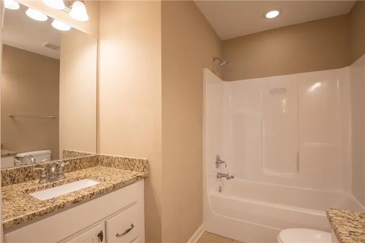 Guest bath with granite c-top (Prior to tenants moving in)