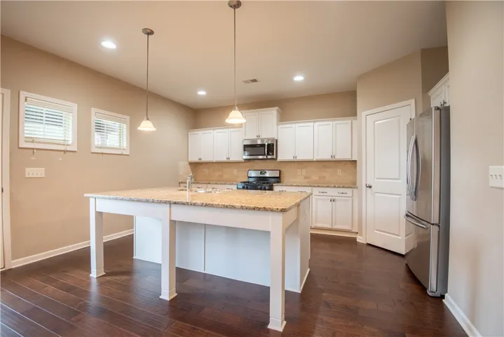 Kitchen with island (prior to tenants moving in)