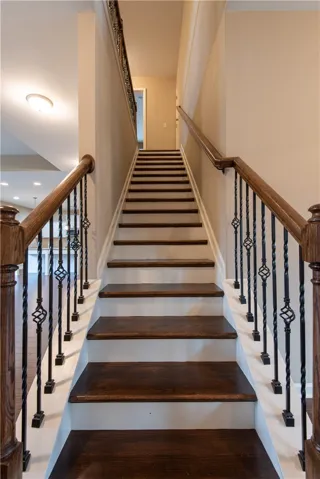 Staircase with wood treads (prior to tenants moving in)