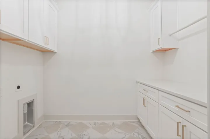 Laundry room with upper and lower cabinets!