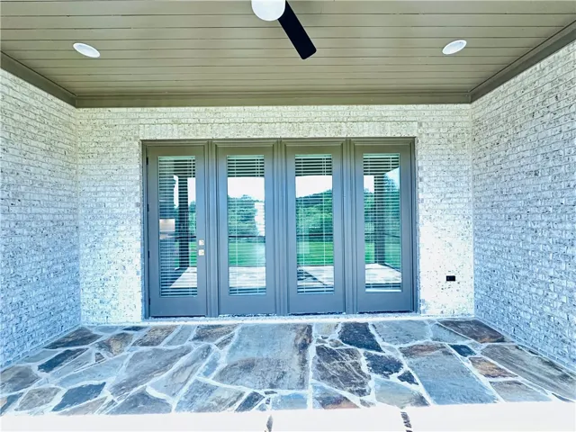 This inviting patio offers a tranquil retreat with ample outdoor living space.