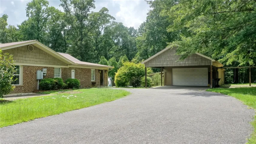 Side entrance and carport
