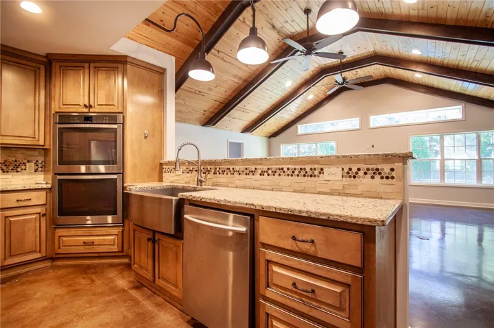 Kitchen breakfast bar overlooking great room