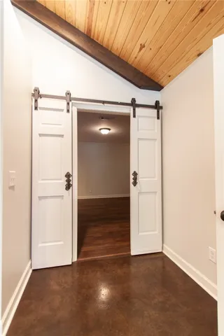 Door to smaller family room off great room