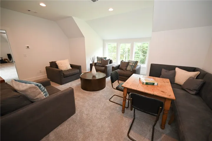 Upstairs bedroom #4: spacious, walk-in closet, AND has an attached bonus room (back left).