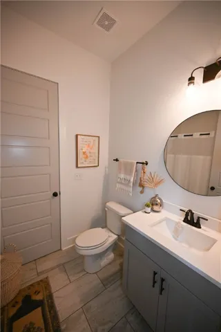 Full bath off of mudroom/kitchen.