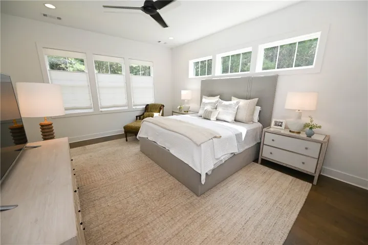 Main level primary bedroom. Windows, windows, windows!!!!