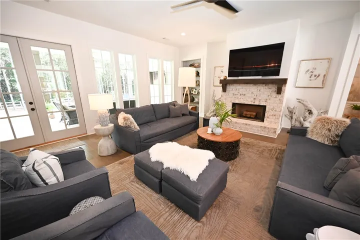Lovely French doors open out from the great room to the covered back porch.
