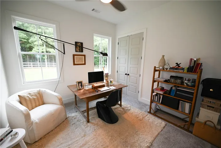 Main level bedroom, currently used as office. (Direct access to full hall bath.)