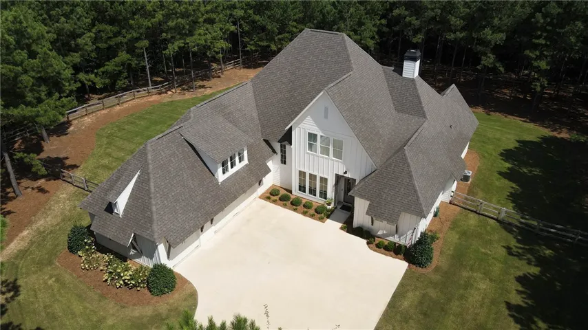 Extended 3 car garage plus plenty of extra parking