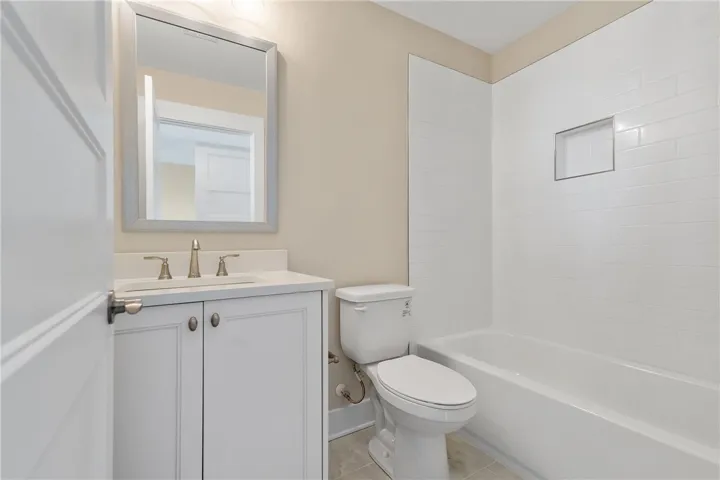 Bright and clean, this bathroom offers a functional layout for everyday living.