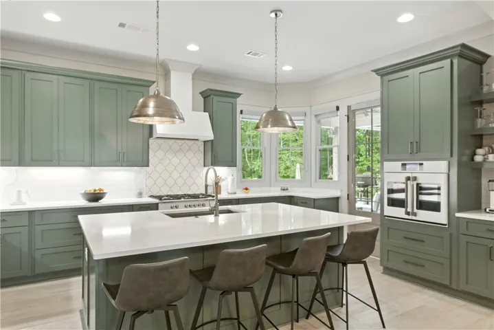 Fabulous gourmet kitchen : 36 inch Fisher & Paykel gas range/gas oven combo, CAFE Smart Electric French door wall convection oven that air fry and roasts to perfection, CAFE French door fridge , CAFE dishwasher/ disposal