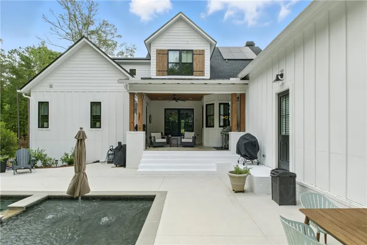 oversized pool deck with ample space for entertaining