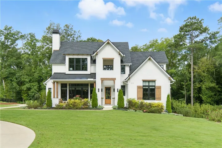 Modern farmhouse style blends the rustic charm of traditional farmhouses with contemporary design elements, creating a look that is both cozy , sophisticated and draws interest.