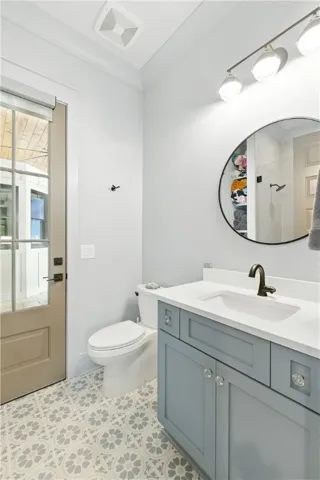 Guest bedroom / pool bath  conveniently placed  when spending time on the pool deck